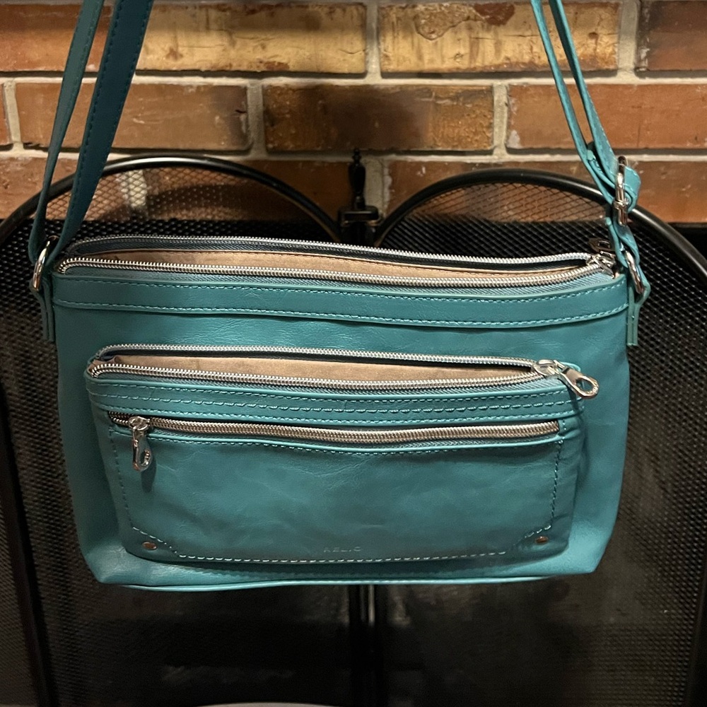 NWOT Teal relic crossbody Mint condition